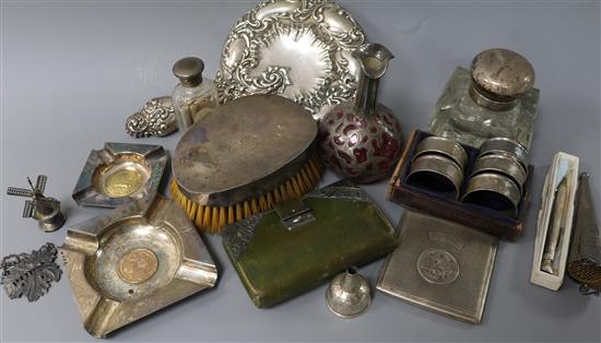 Mixed silver items including napkin rings, hand mirror, cigarette case, aide memoire, clothes brush etc.